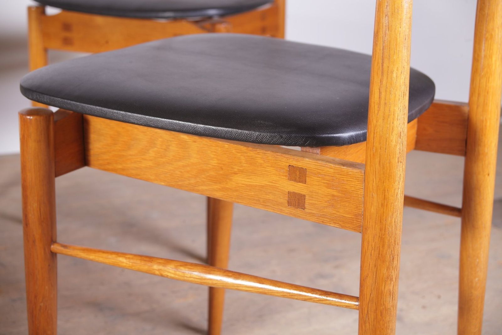 photo for sale Mid Century Oak And Black Leather Dining Chairs From Uluv, Former Czechoslovakia, 1960s, Set Of 4