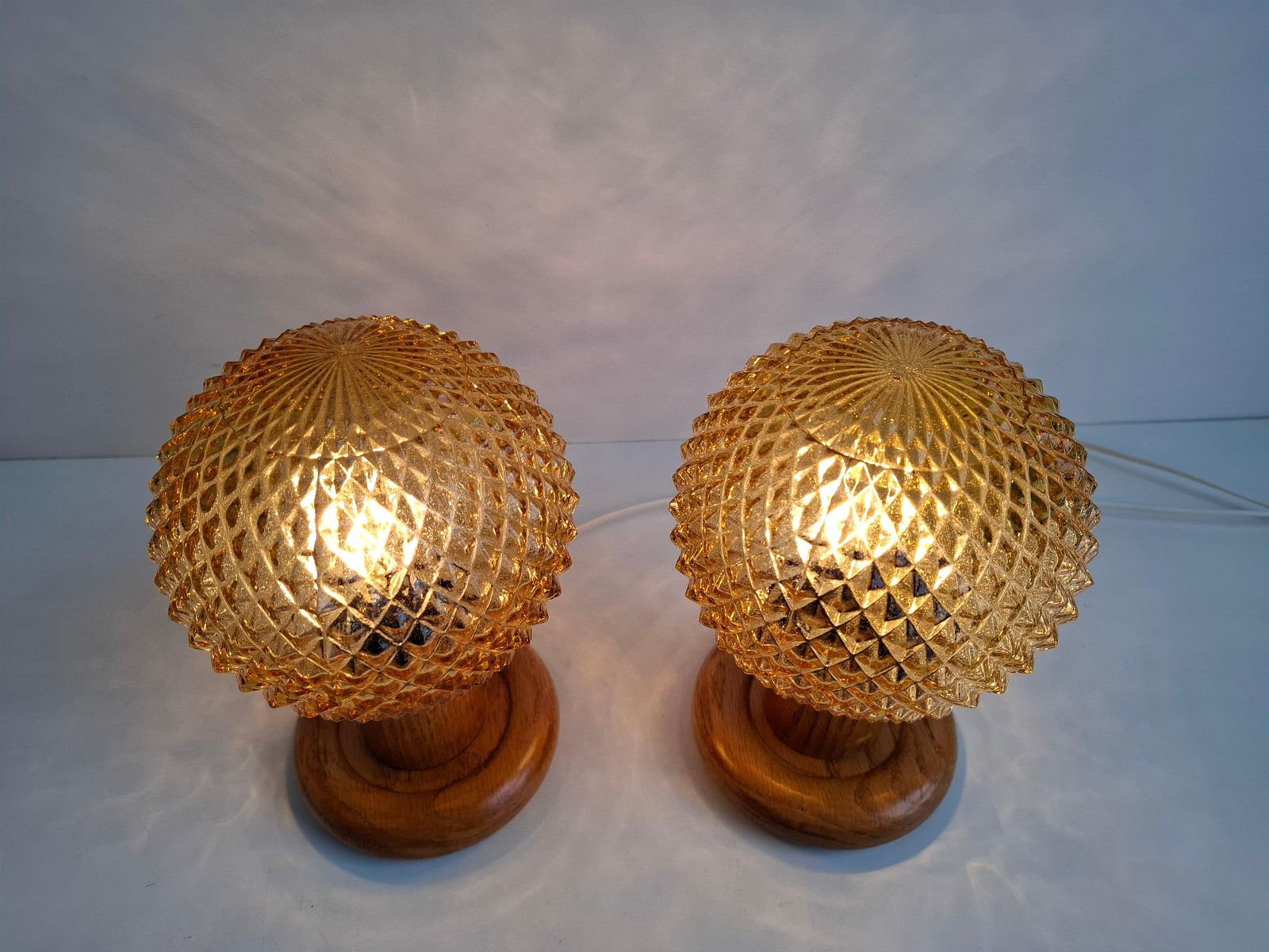 photo furniture Pair Of Mid Century Table Lamps With Amber Glass And Wood Base, Czechoslovakia