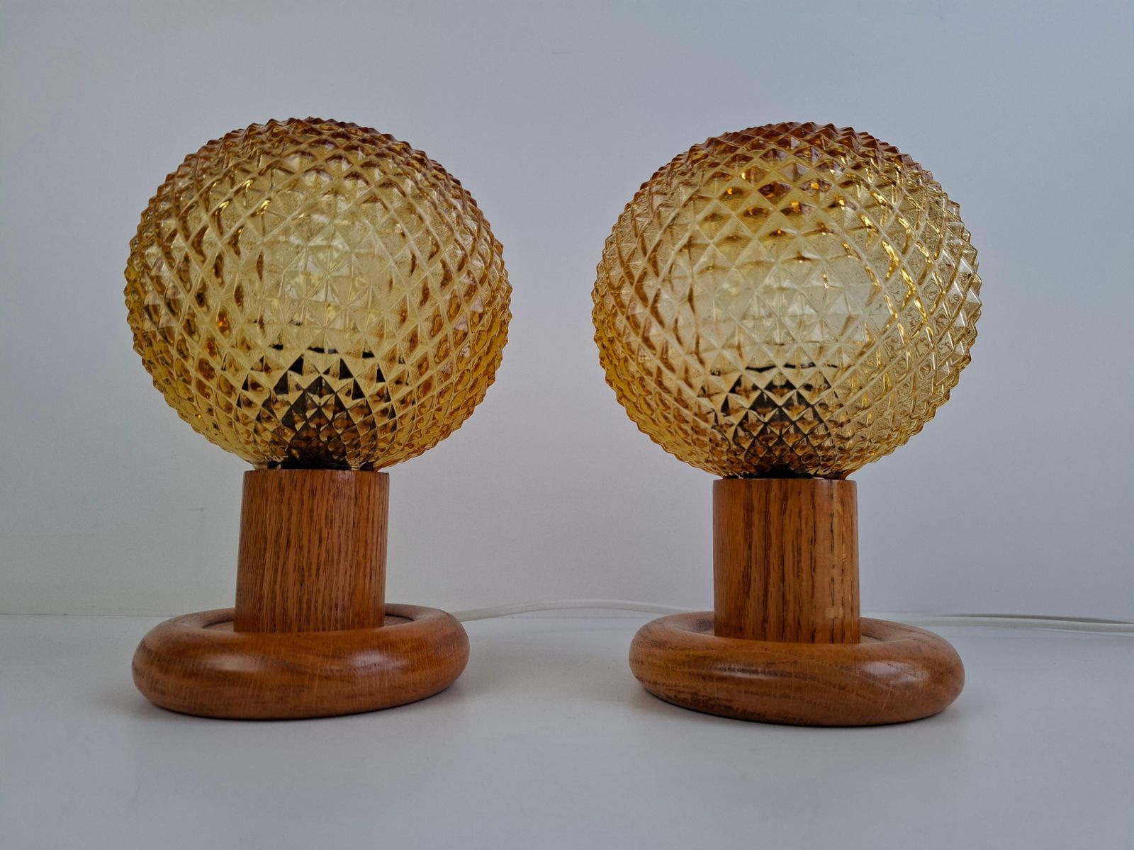 photo vinterior Pair Of Mid Century Table Lamps With Amber Glass And Wood Base, Czechoslovakia