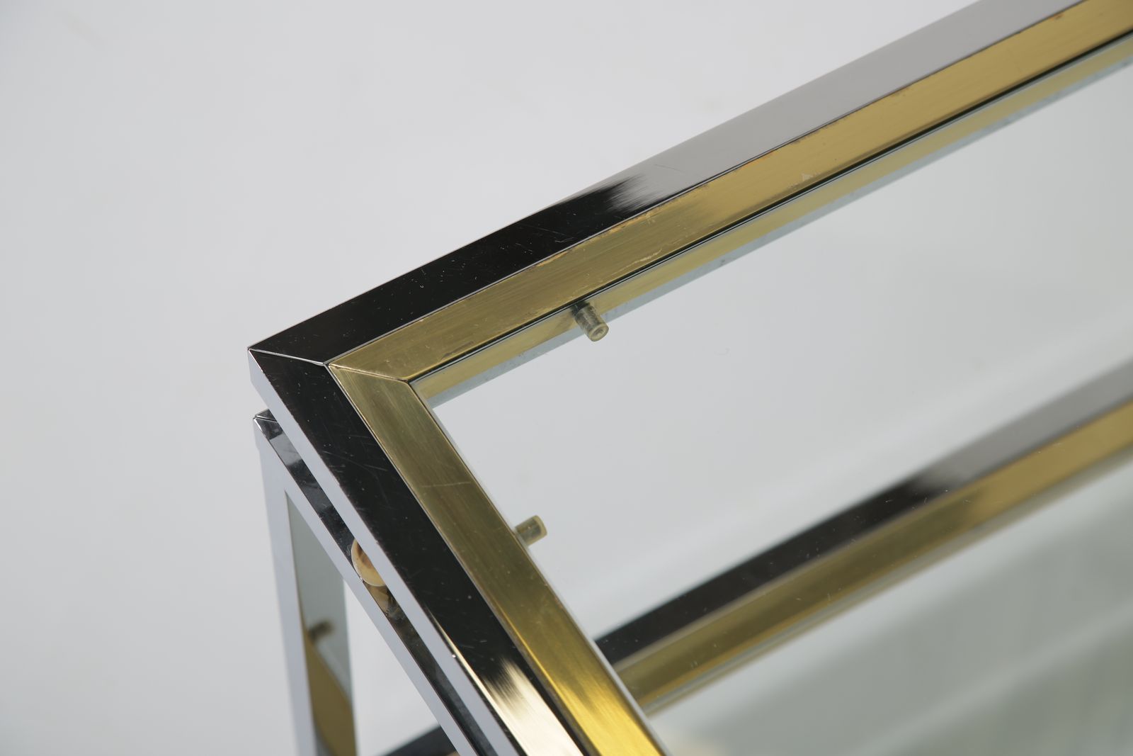 photo buy Renato Zevi Attributed Two Tier Coffee Table: In Chrome And Polished Brass, Italy, 1970s.