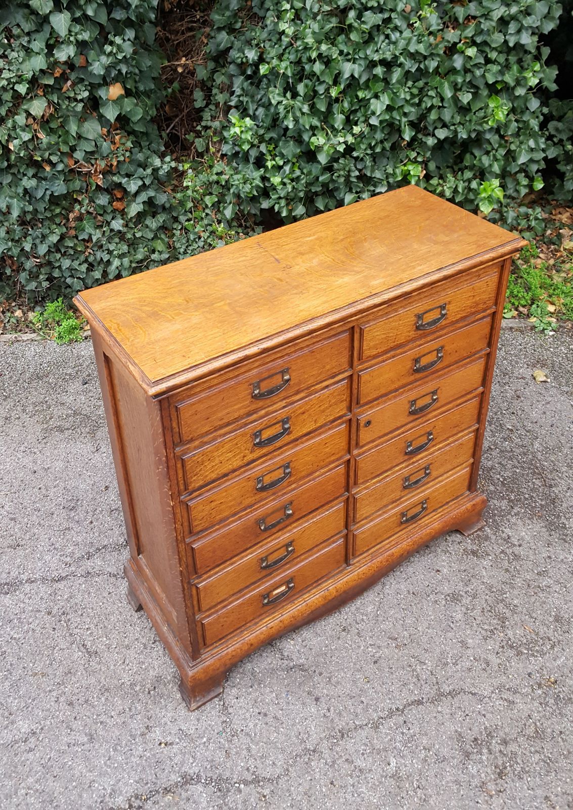675.0 Antique Oak Chest Of 12 Drawers photo