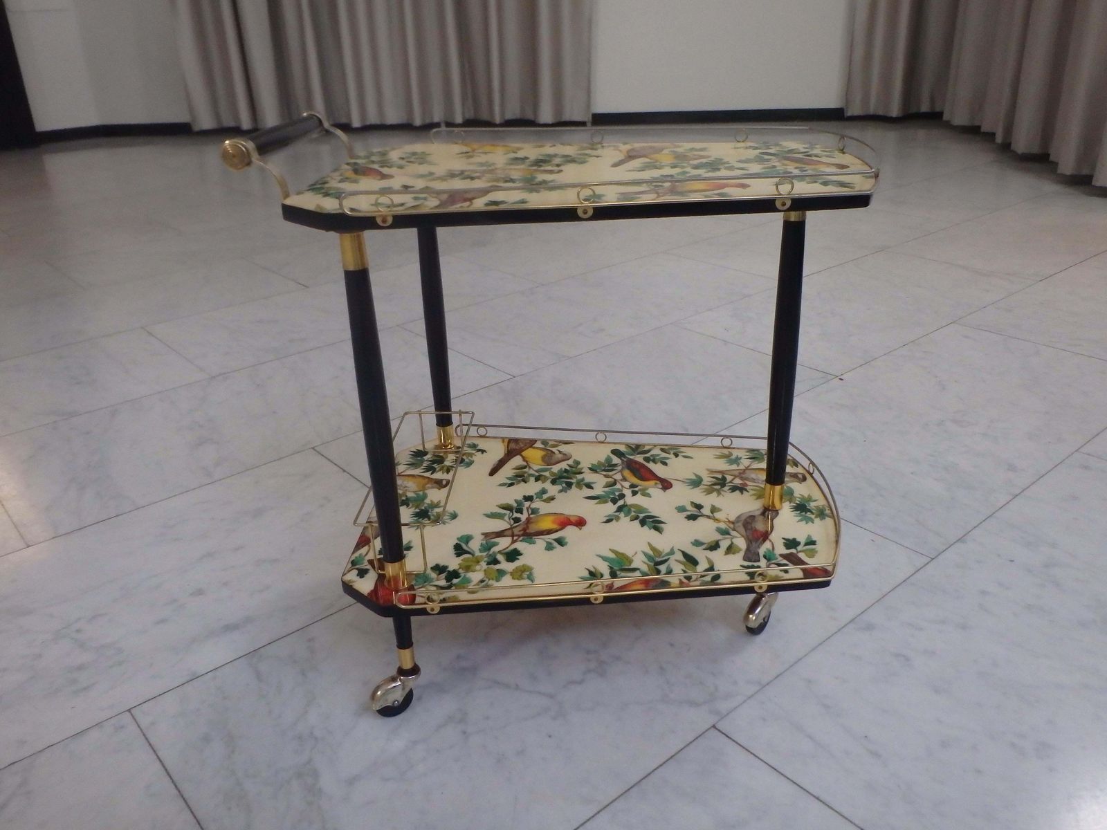 1950s Bar Cart On 3 Wheels With Beautiful Birds On The Shelf photo for sale