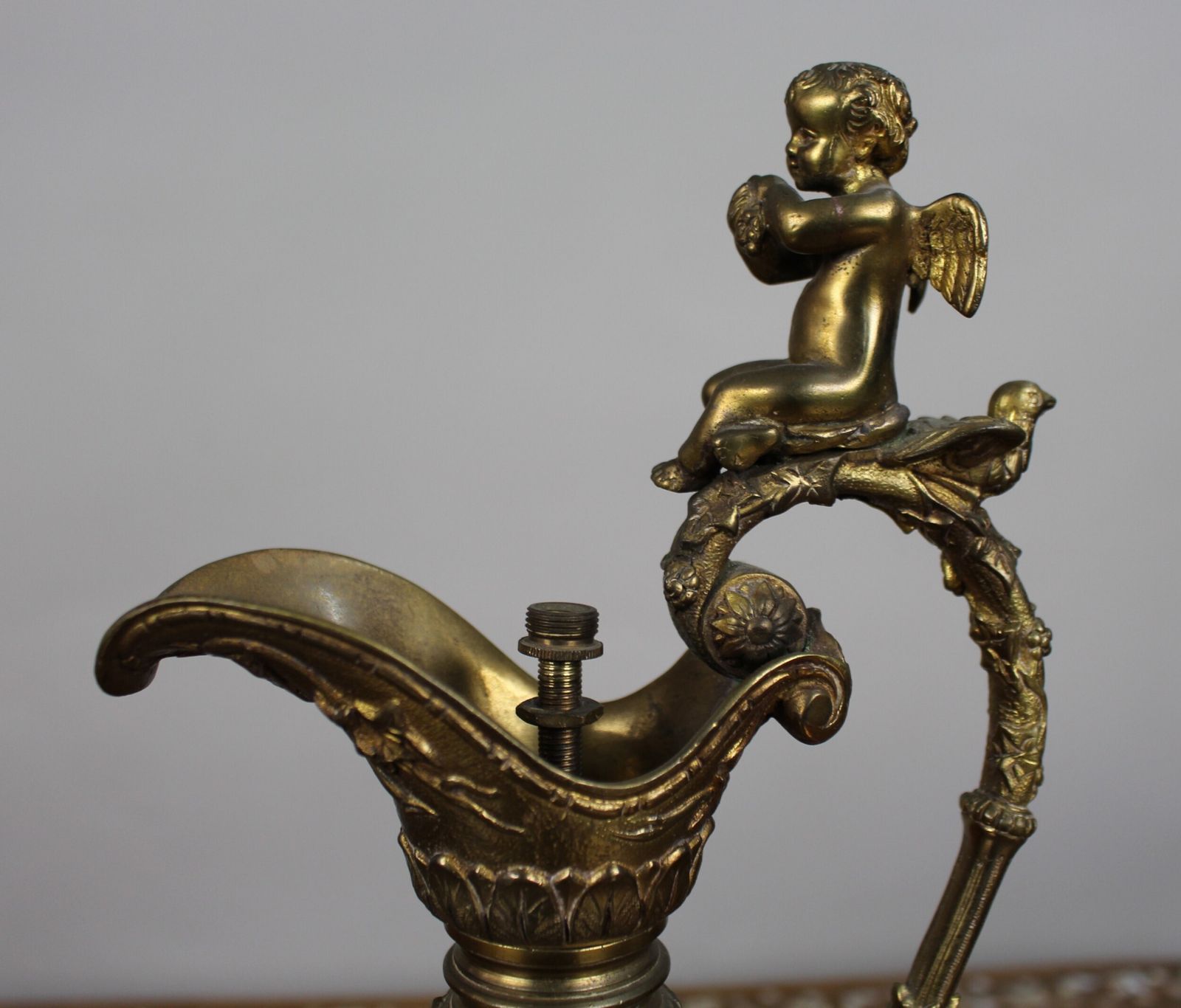 photo for sale Pair Of 19th Century French Gilt Bronze Bacchanalian Ewers With Cherubs