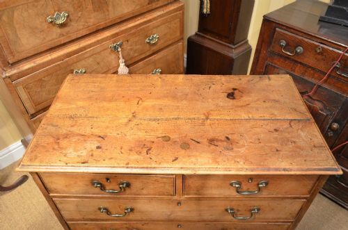 photo furniture A George II Fruitwood / Walnut Small Chest Of Drawers.