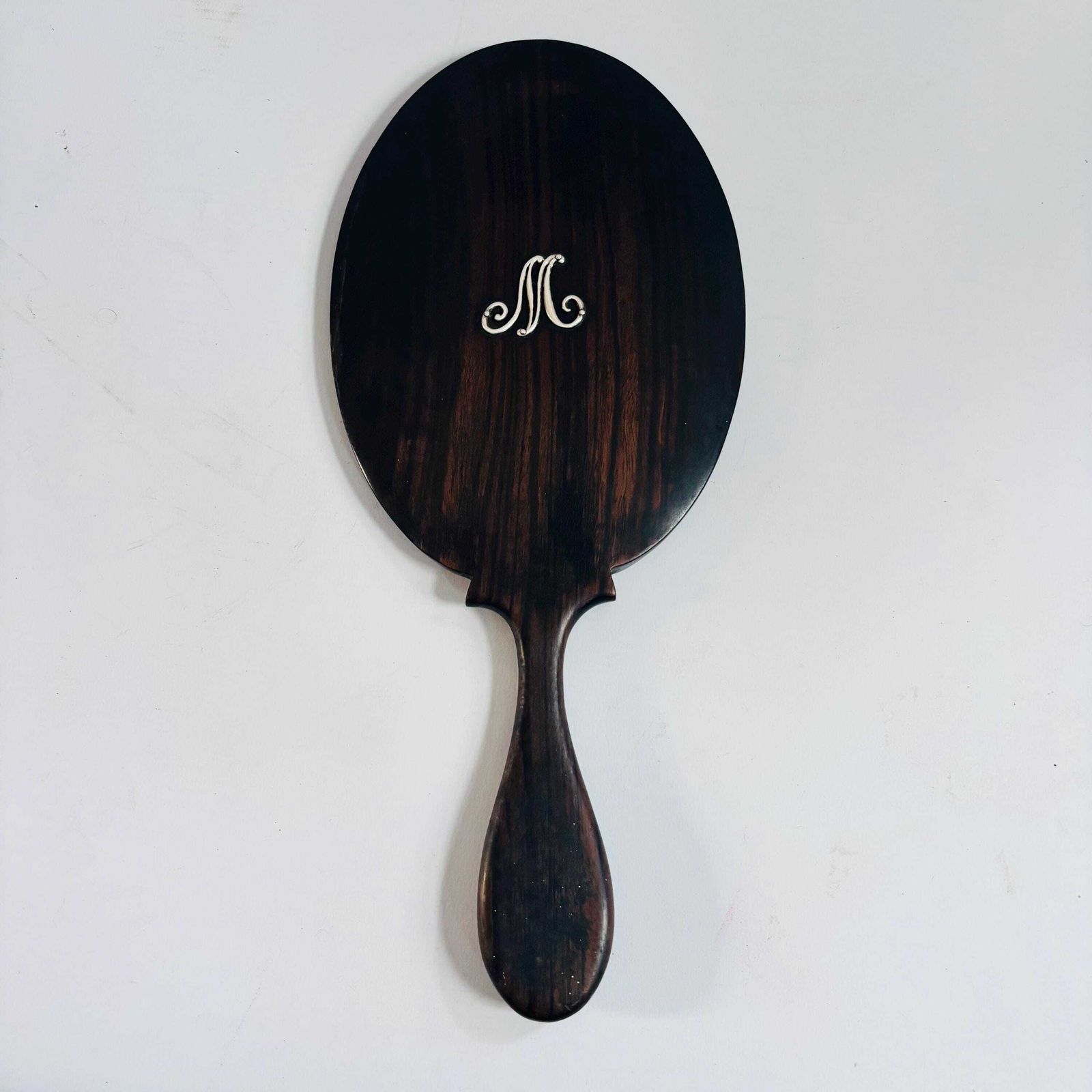 photo for sale Antique Ebonised Beech Wood Hand Mirror: 1890s 'M' Silver Initial Victorian Bevelled Glass
