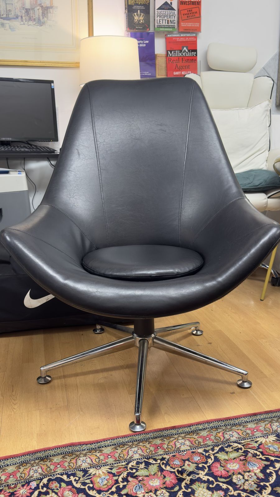 Retro High Backed Black Leather Swivel Armchair photo furniture