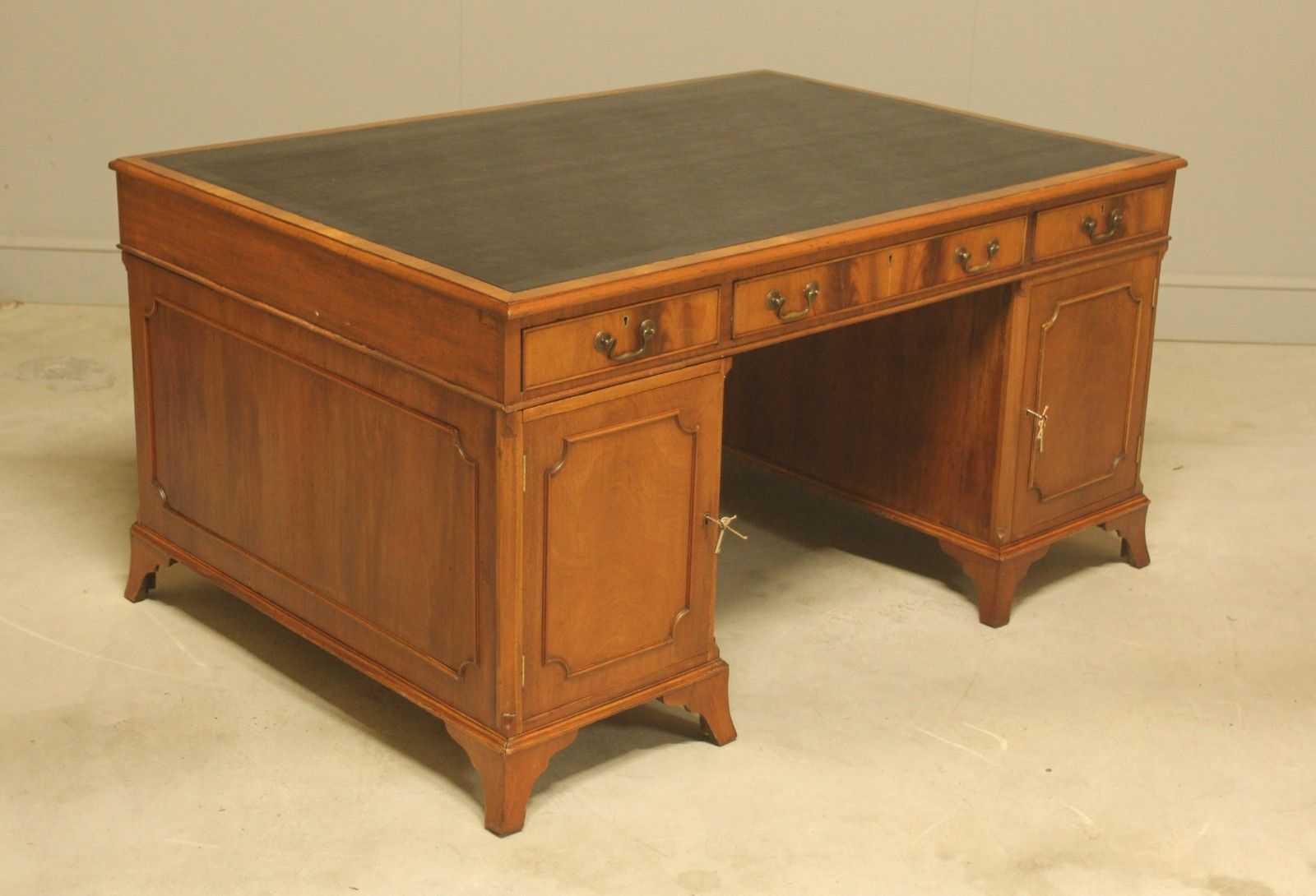 An Early 20th Century Curl Mahogany Partners Desk photo buy
