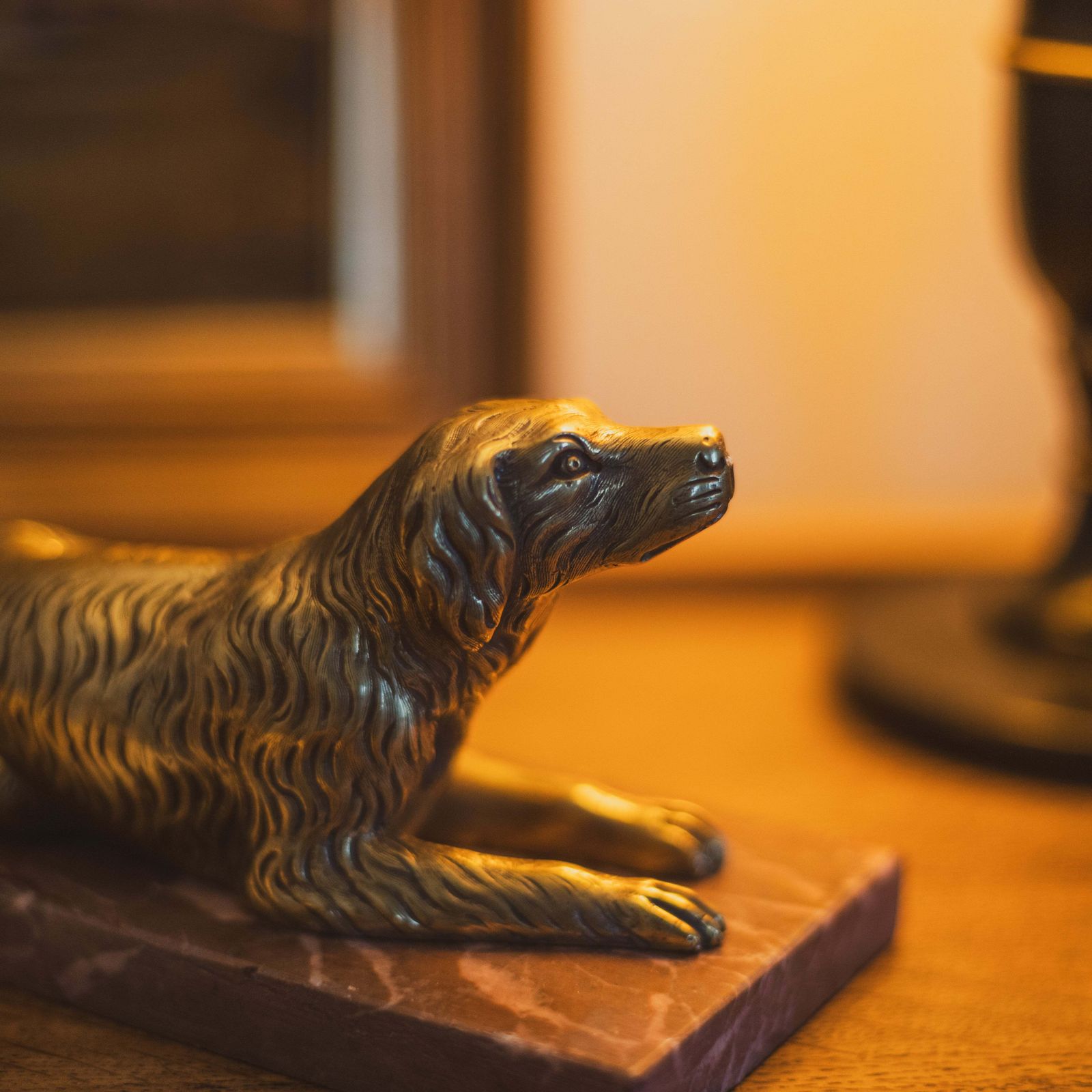 photo furniture A 19th Century Gilt Bronze Study Of A Reclining Labrador Dog On A Rouge Marble Base