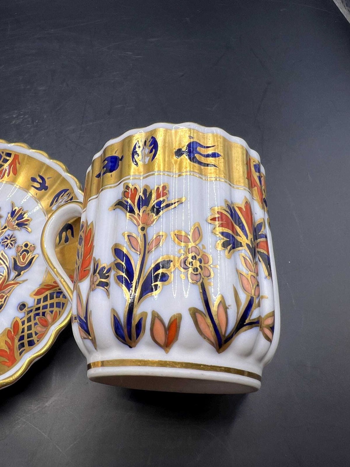photo for sale Antique Coffee Can  Tea Cup And Saucer Vibrant Imari Pattern With Gold Gilt Stamped Copeland 5.257. As Is