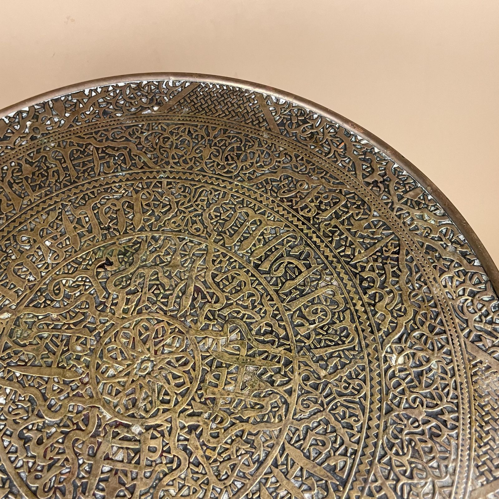 Antique Metal Gold Brass Indian Table Patterned Tray Top Asian Handmade Intricate Decorative Round Coffee Side Wood Pin Legs Vintage photo for sale