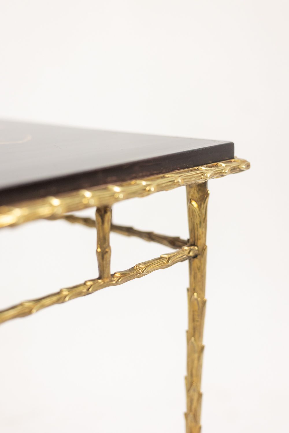 photo furniture Maison Baguès. Coffee Table In Bronze, Black Lacquer, Gold Decoration. Circa 1970