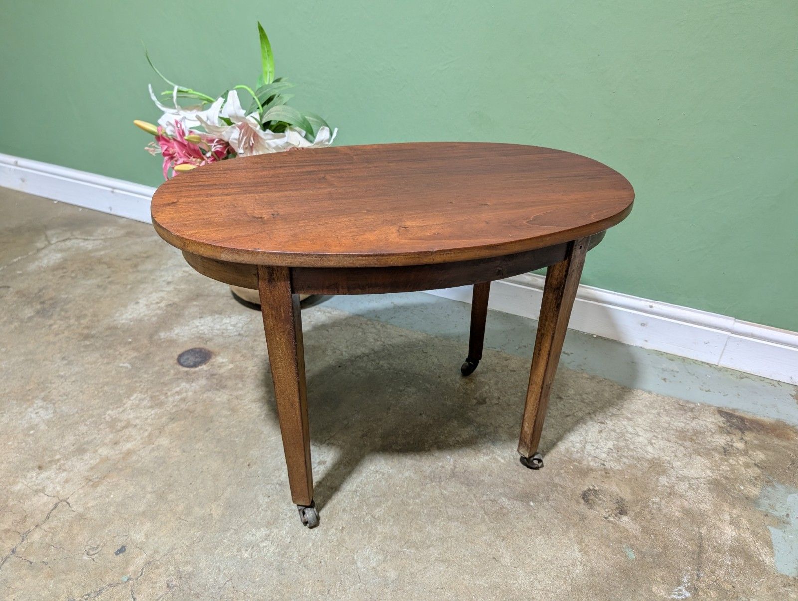 65.0 Antique Mahogany Oval Top Side Table On Brass Castors Wine End Plant Stand. photo