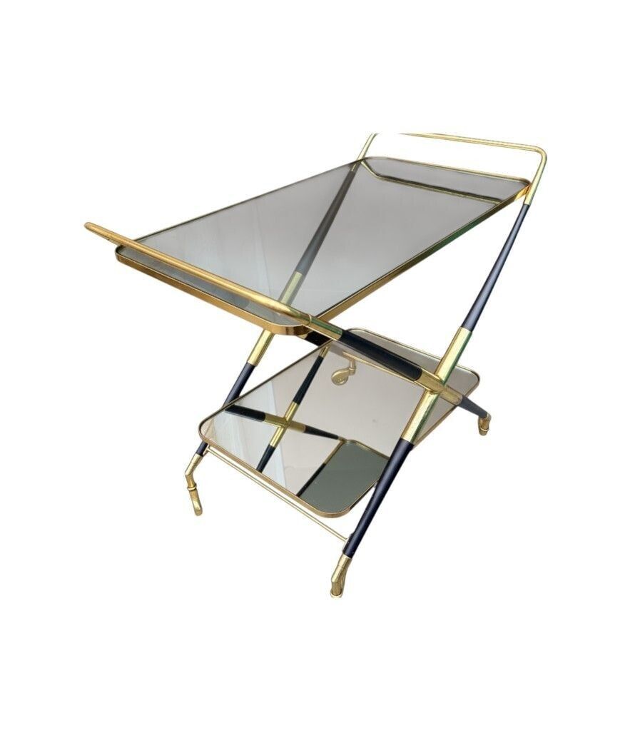 photo furniture An Italian 1950s Black Lacquer And Brass Bar Trolley By Cesare Lacca