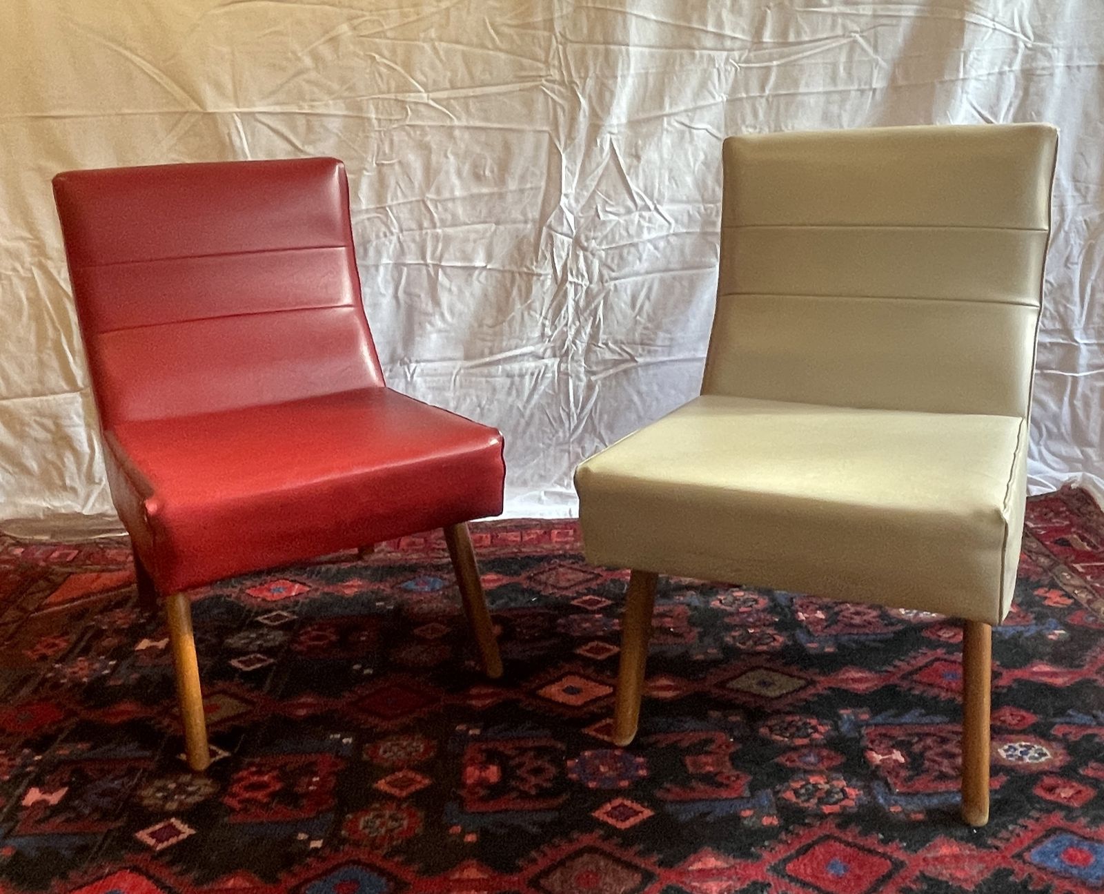 A Pair Of Mid Century Scandinavian Danish Style Teak And Vinyl Lounge Chairs