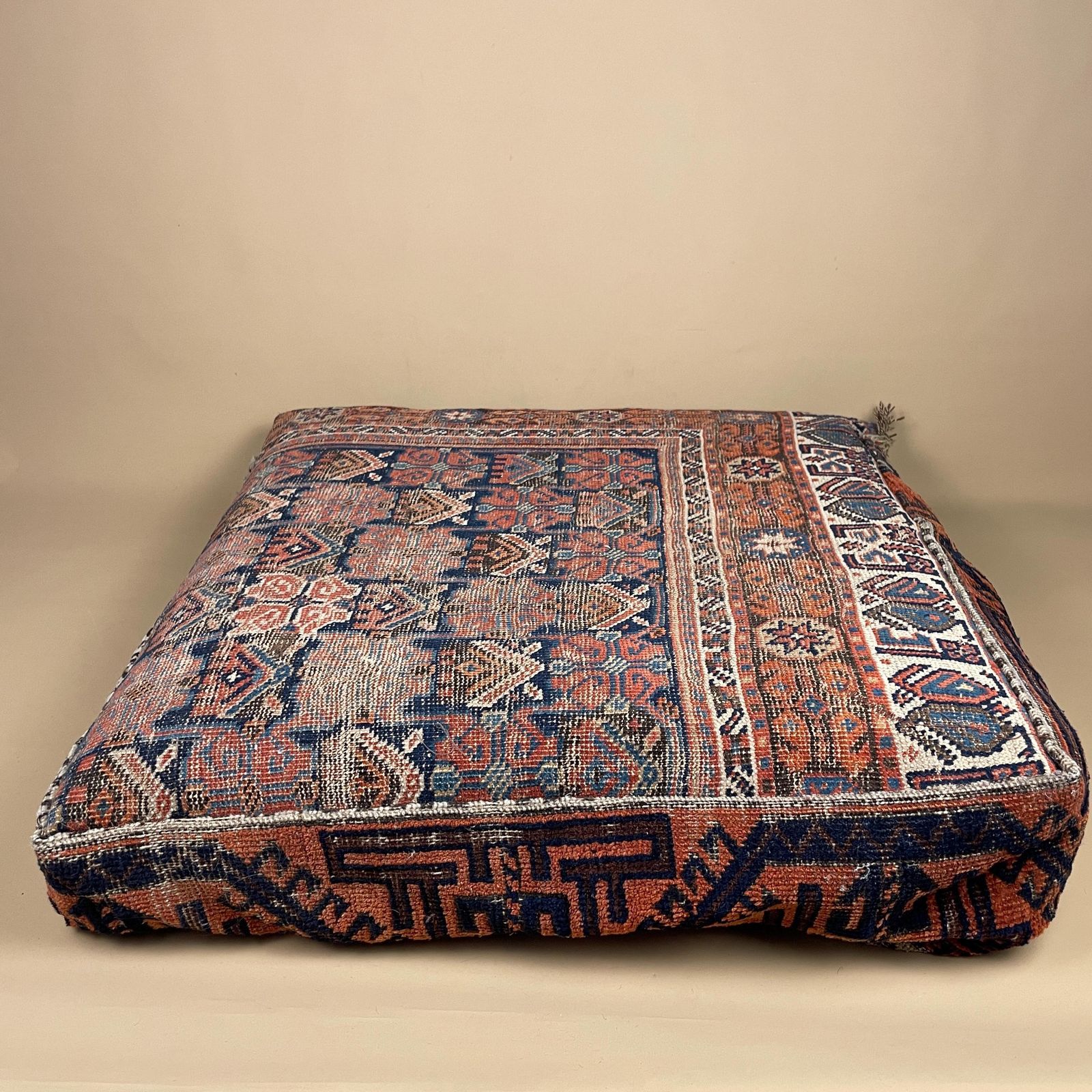 Vintage Carpet Floor Cushion Wool Rug Leather Backed Turkish Handwoven Pouffe Sofa Seat Handmade Red Geometric Decorative Accent photo vinterior