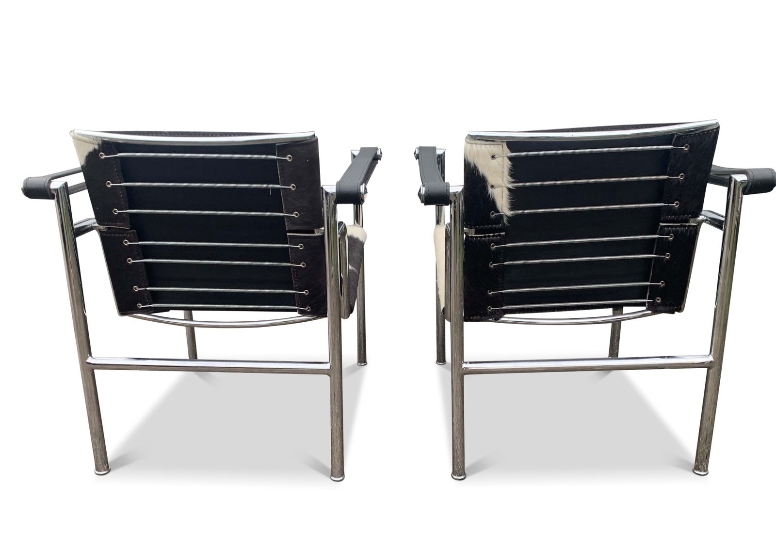 A Pair Of Le Corbusier Style Lc1 Pony Skin Sling Armchairs With Chromed Tubular Frame No Labels Or Markings Circa 1980s/1990s photo vintage
