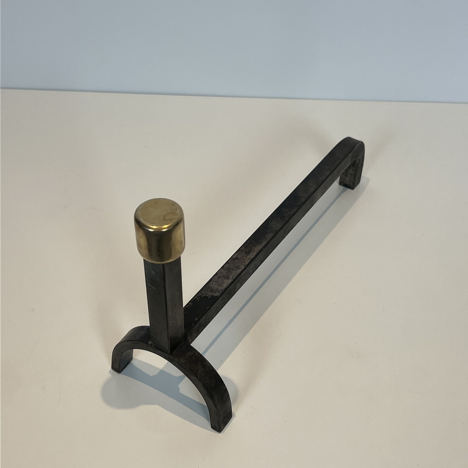 photo furniture Pair Of Modernist Wrought Iron And Brass Andirons