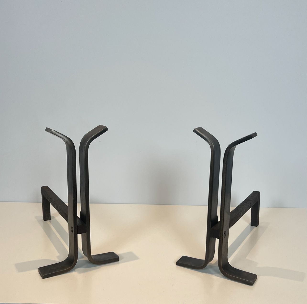 Pair Of Modernist Steel And Wrought Iron Andirons