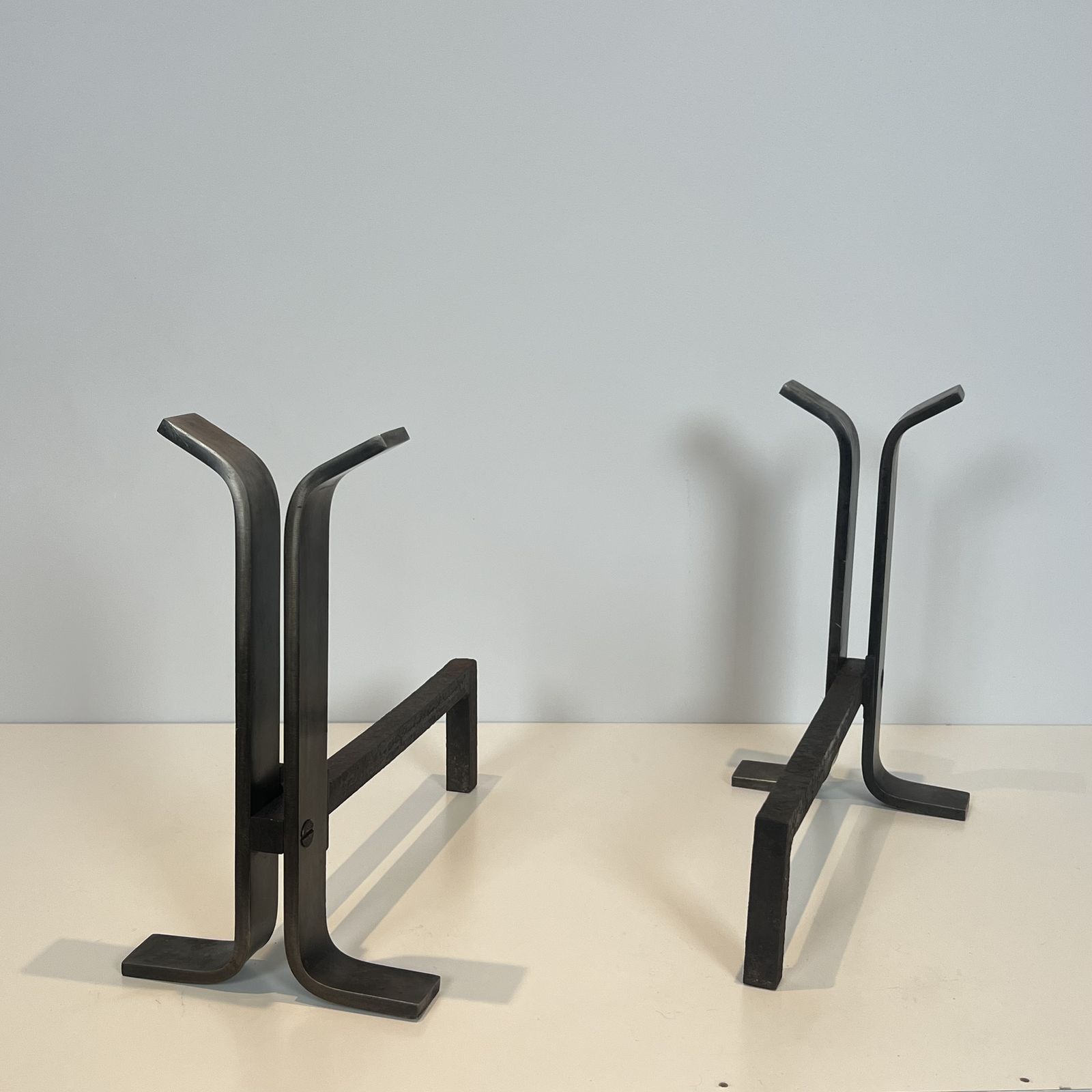 Pair Of Modernist Steel And Wrought Iron Andirons photo vinterior