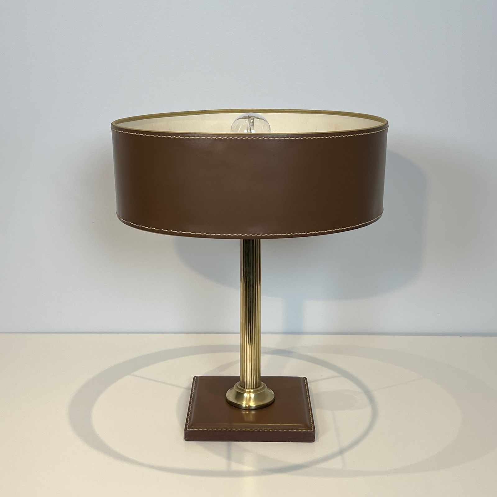 photo buy Brown Leather And Brass Desk Lamp In The Style Of Jacques Adnet