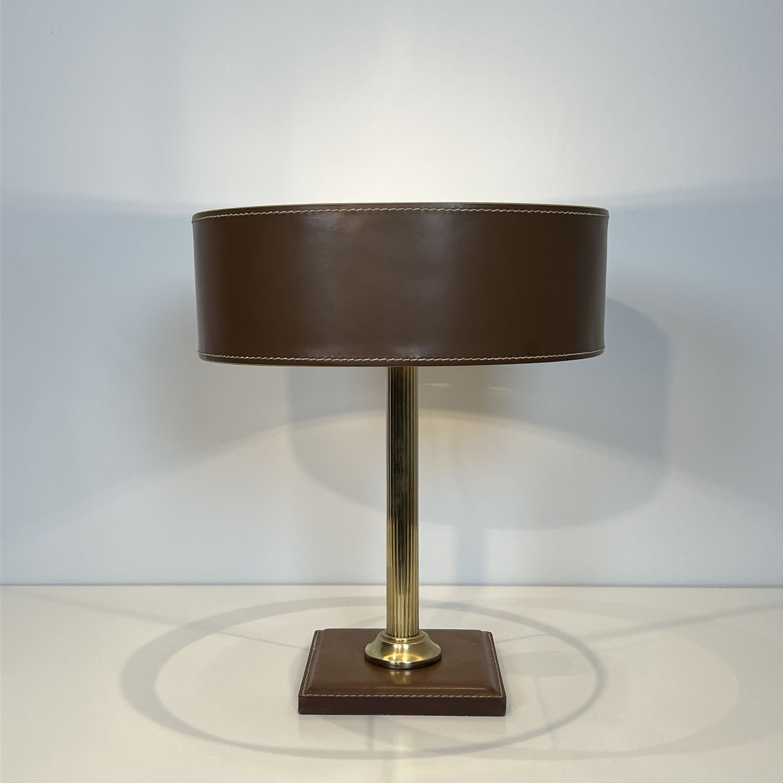 photo vintage Brown Leather And Brass Desk Lamp In The Style Of Jacques Adnet