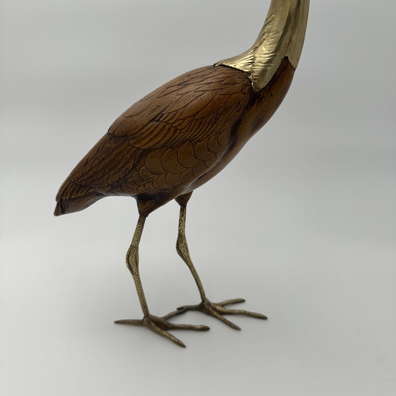 Art Pair Of Birds In Wood And Chiseled Brass photo