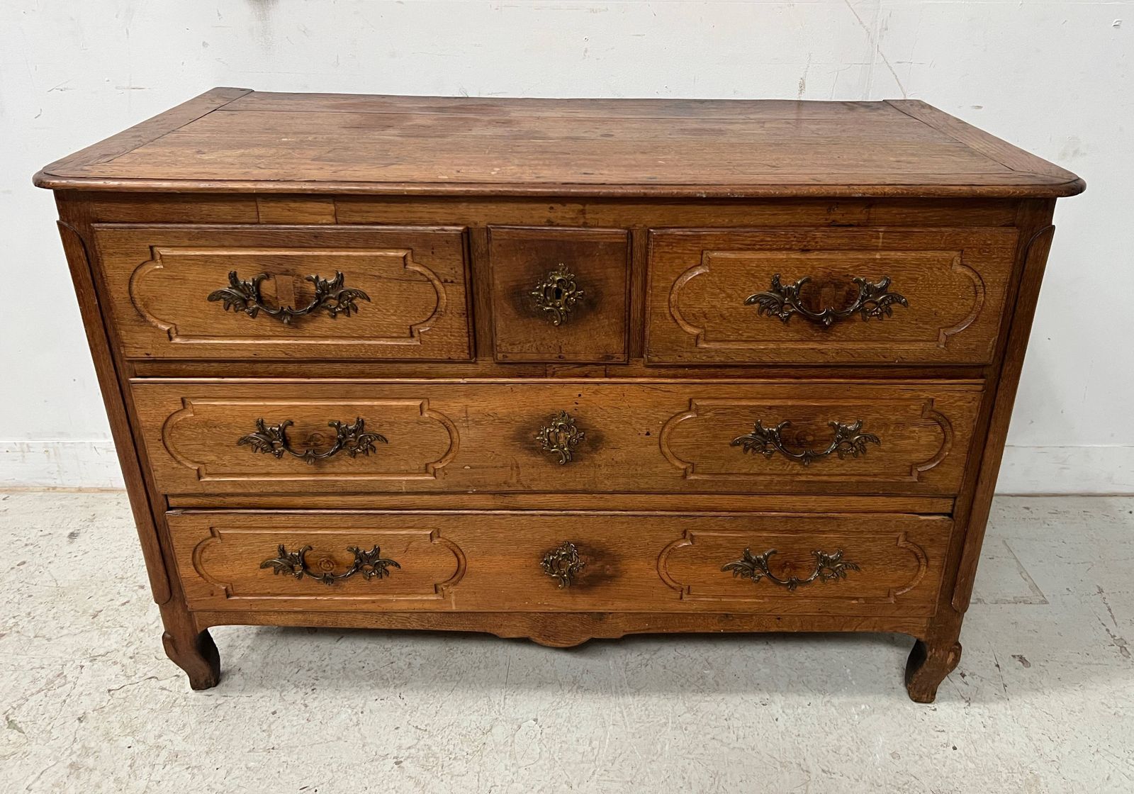 1945.0 Louis XV Style Chest Of Drawers In Solid Oak From The 18th Century photo