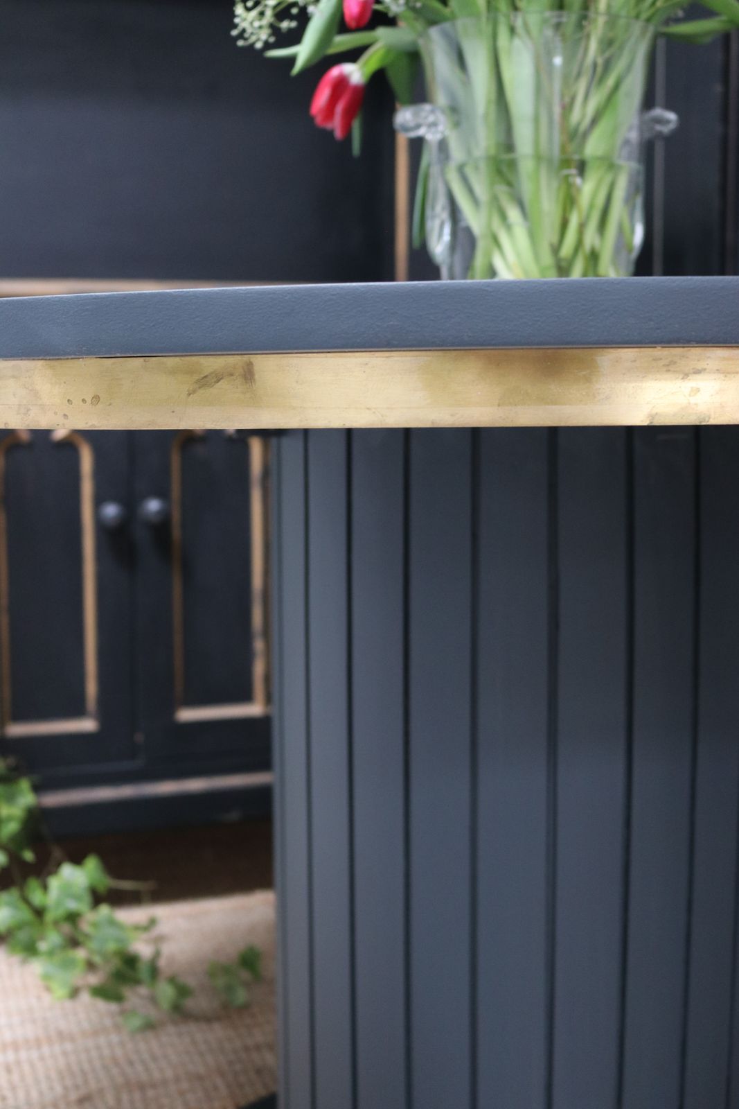 Stunning Black Round Dining Table With Brass Metal Edge Slatted Wood Column Base photo buy