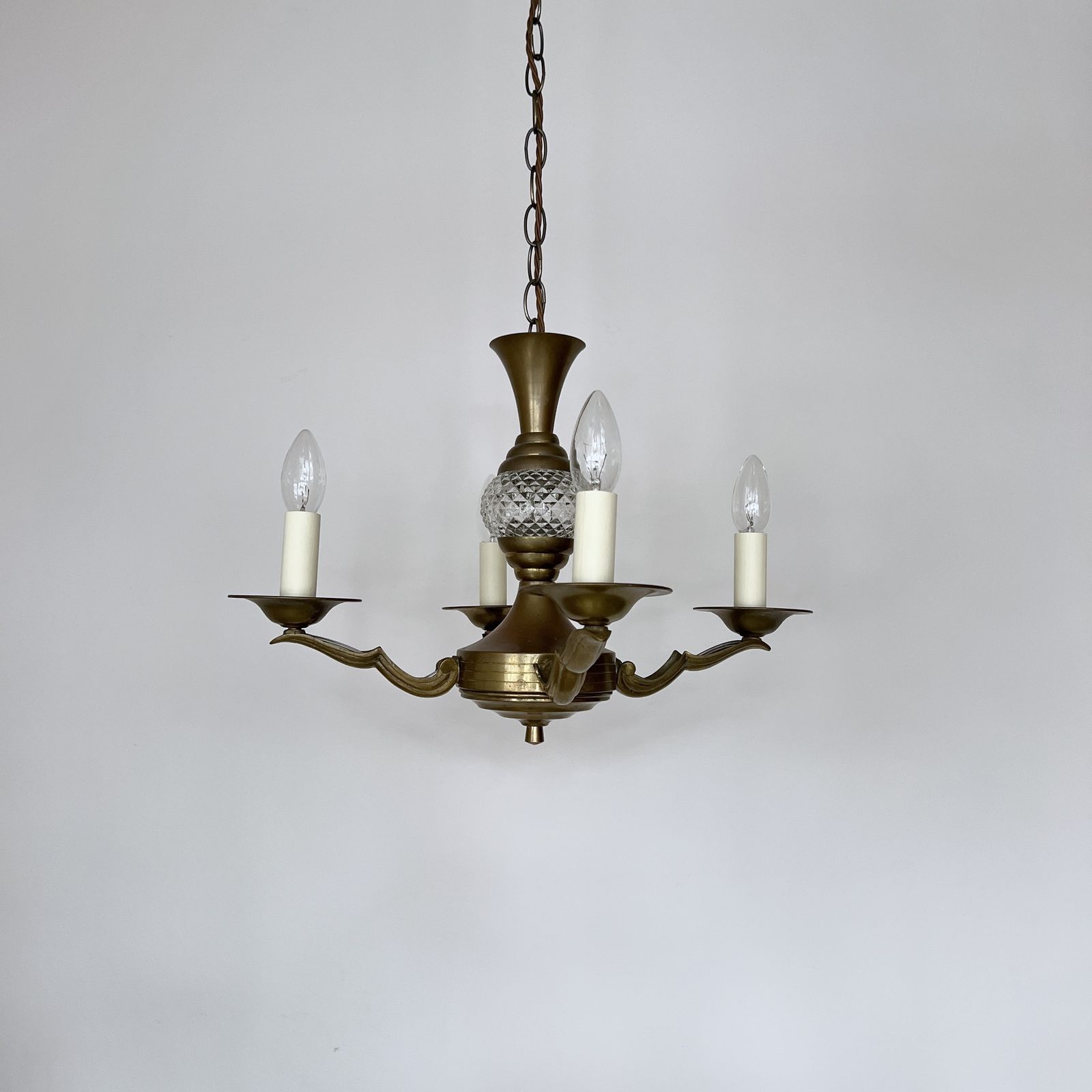 Brass Four Arm Chandelier With Faceted Glass Stem Detail