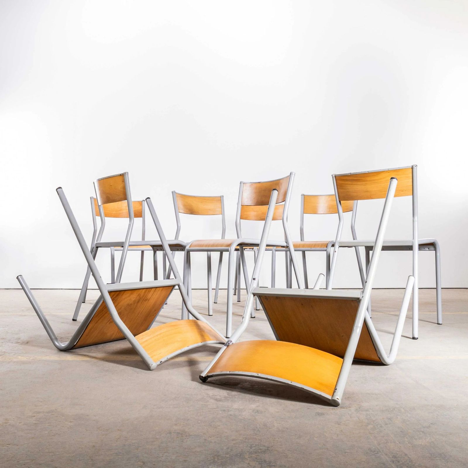 photo furniture 1950’s French Mullca Stacking Dining Chairs – Grey Wide Seat 510 – Set Of Nine