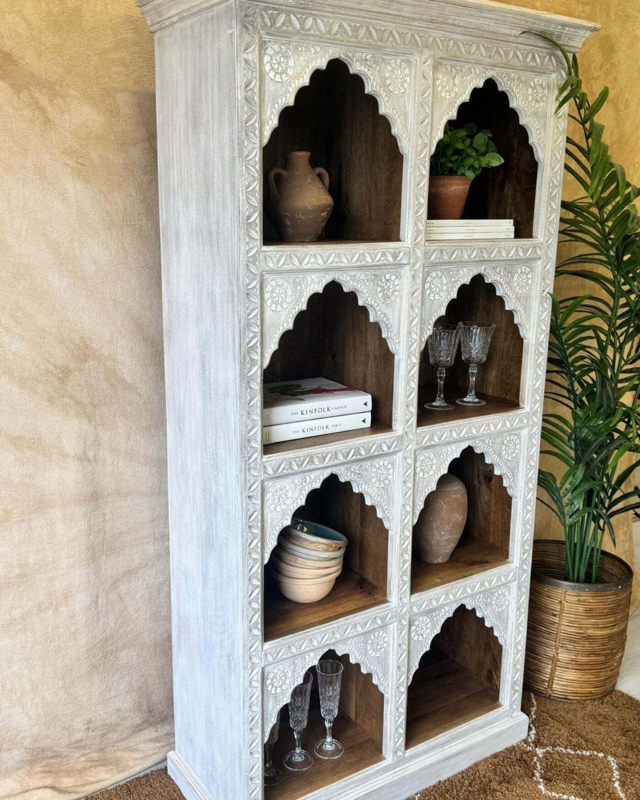 Hand Carved Mango Wood Bookcase With A Light Natural Cream Washed Finish And Arched Shelves photo for sale