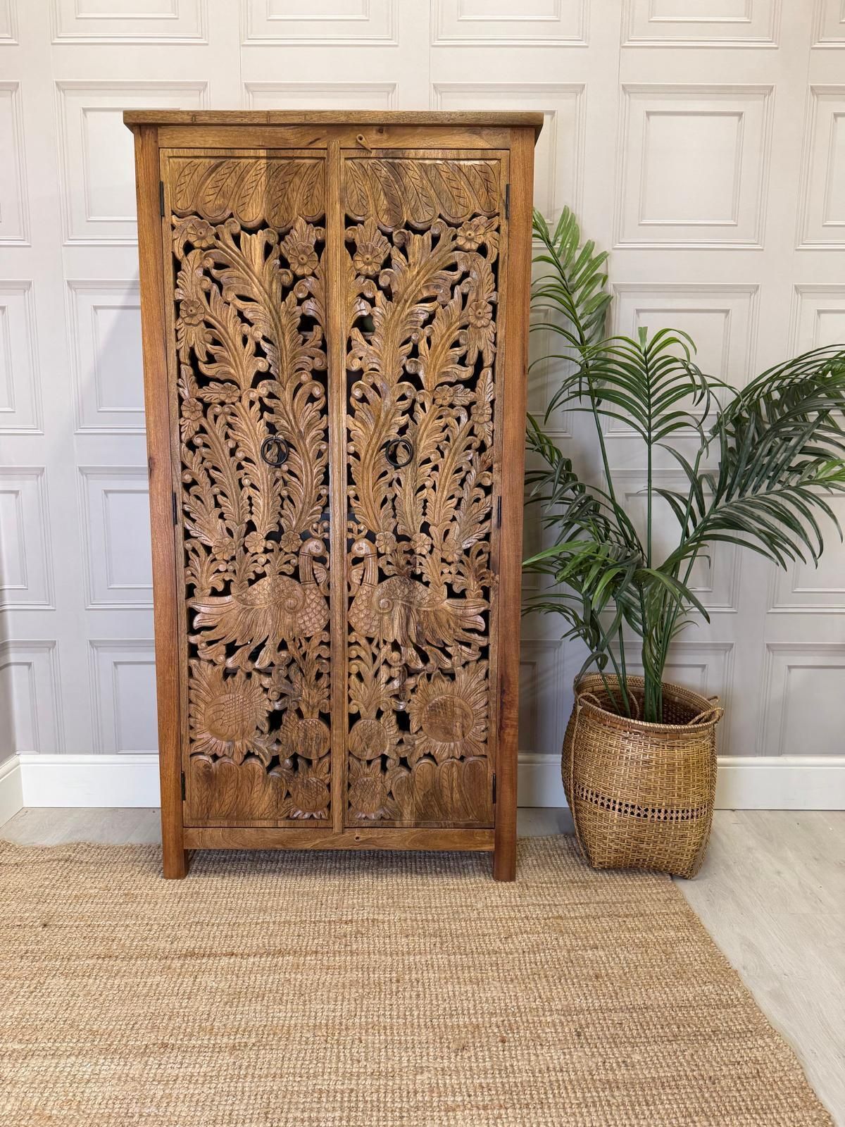 Hand Carved Mango Wood Cabinet With Peacock And Flower Design In A Natural Finish. photo vinterior