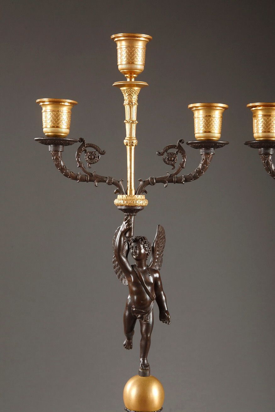 Pair Of Putti Candelabra In Gilt And Patinated Bronze photo vinterior