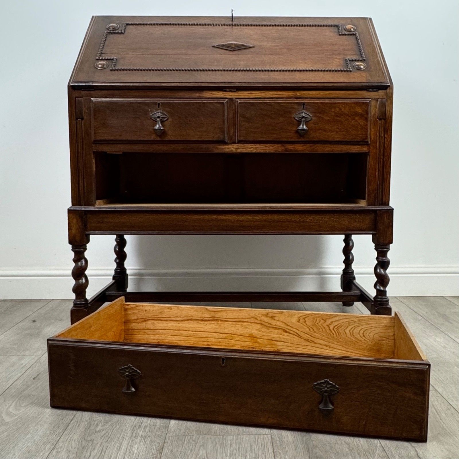 425.0 Antique 20th Century Jacobean Style Bureau In Oak photo