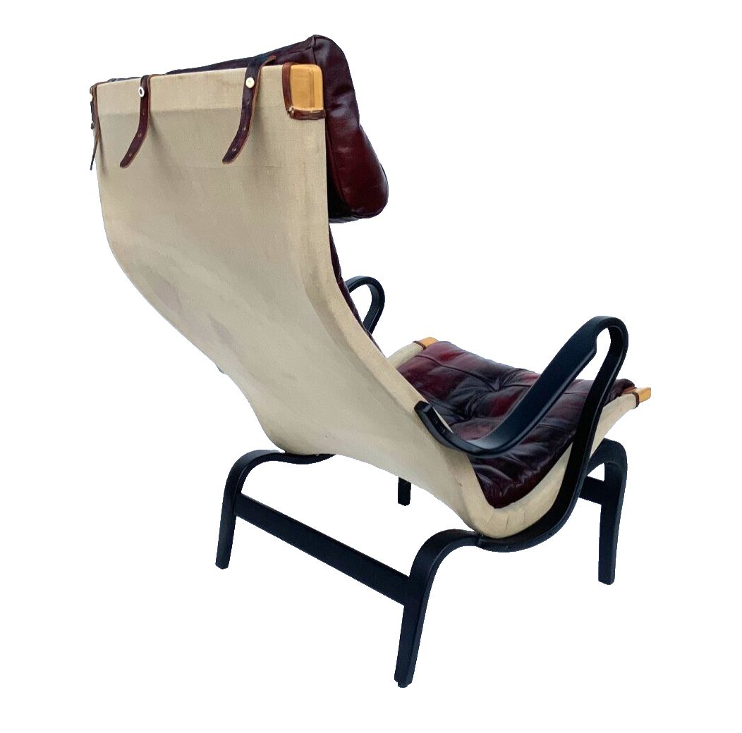 Furniture Vintage Pernilla 69 Armchair By Bruno Mathsson For Dux In Oxblood Leather 1960s photo