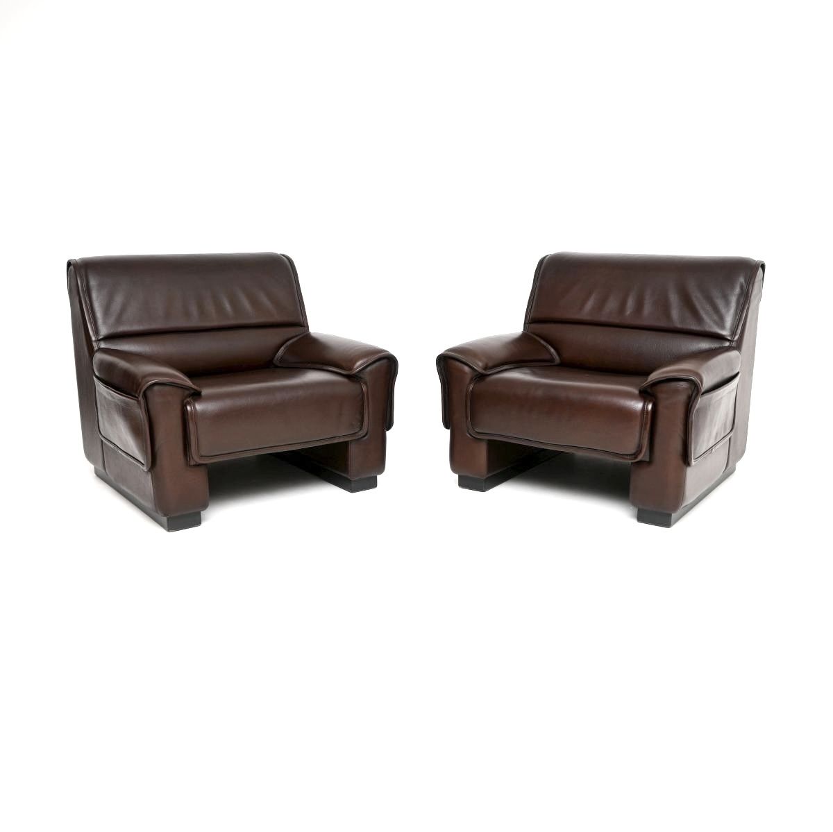 Pair Of Vintage Leather Armchairs And Stool By De Sede photo furniture