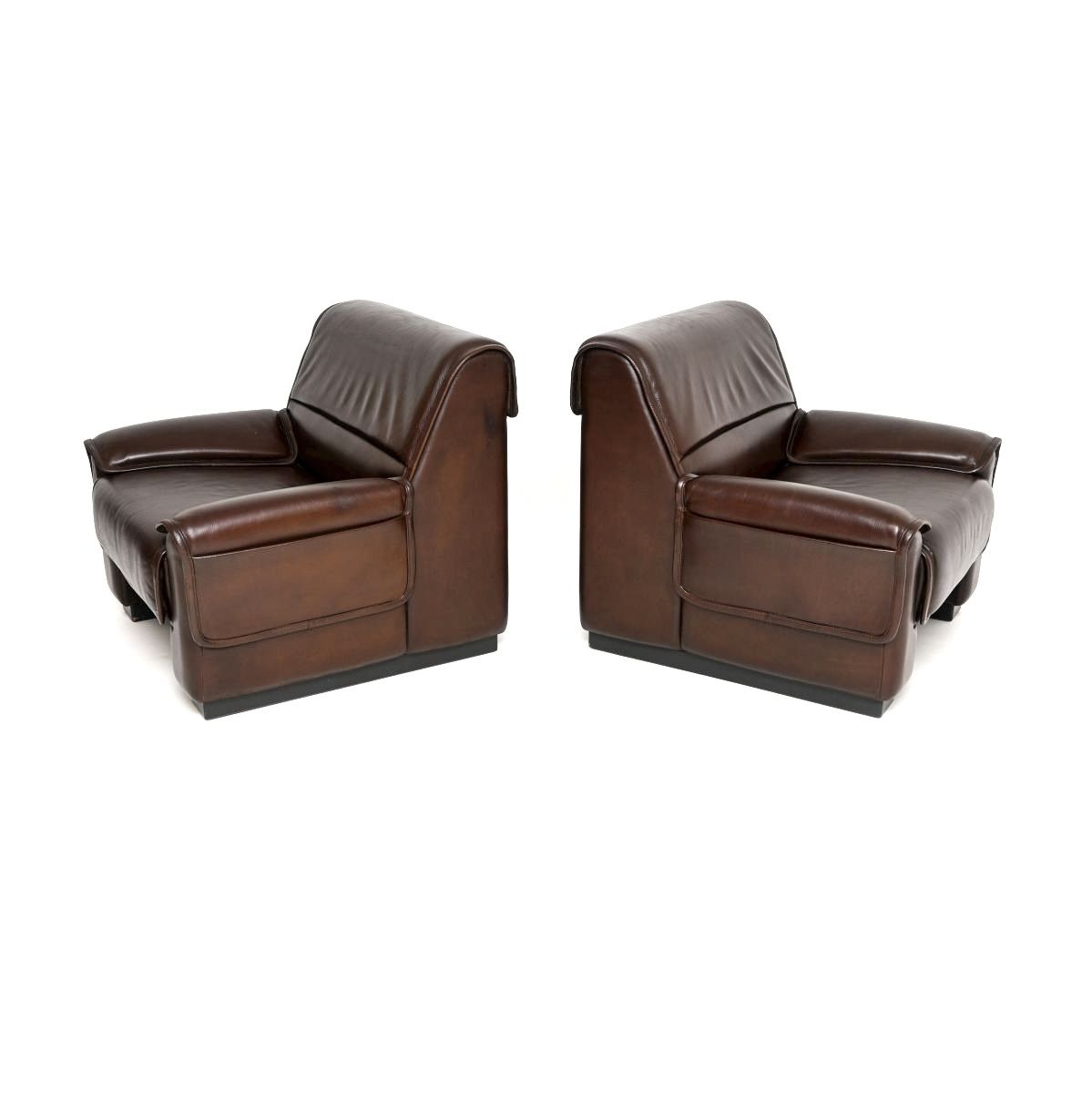photo furniture Pair Of Vintage Leather Armchairs And Stool By De Sede