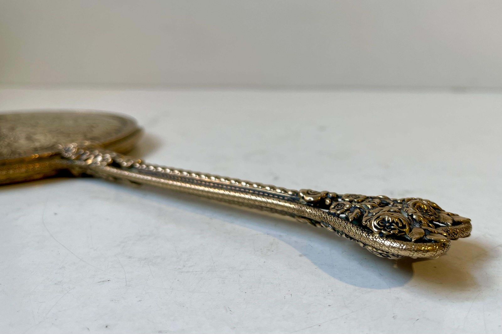 photo furniture Antique French Hand Mirror In Etched & Reticulated Bronze