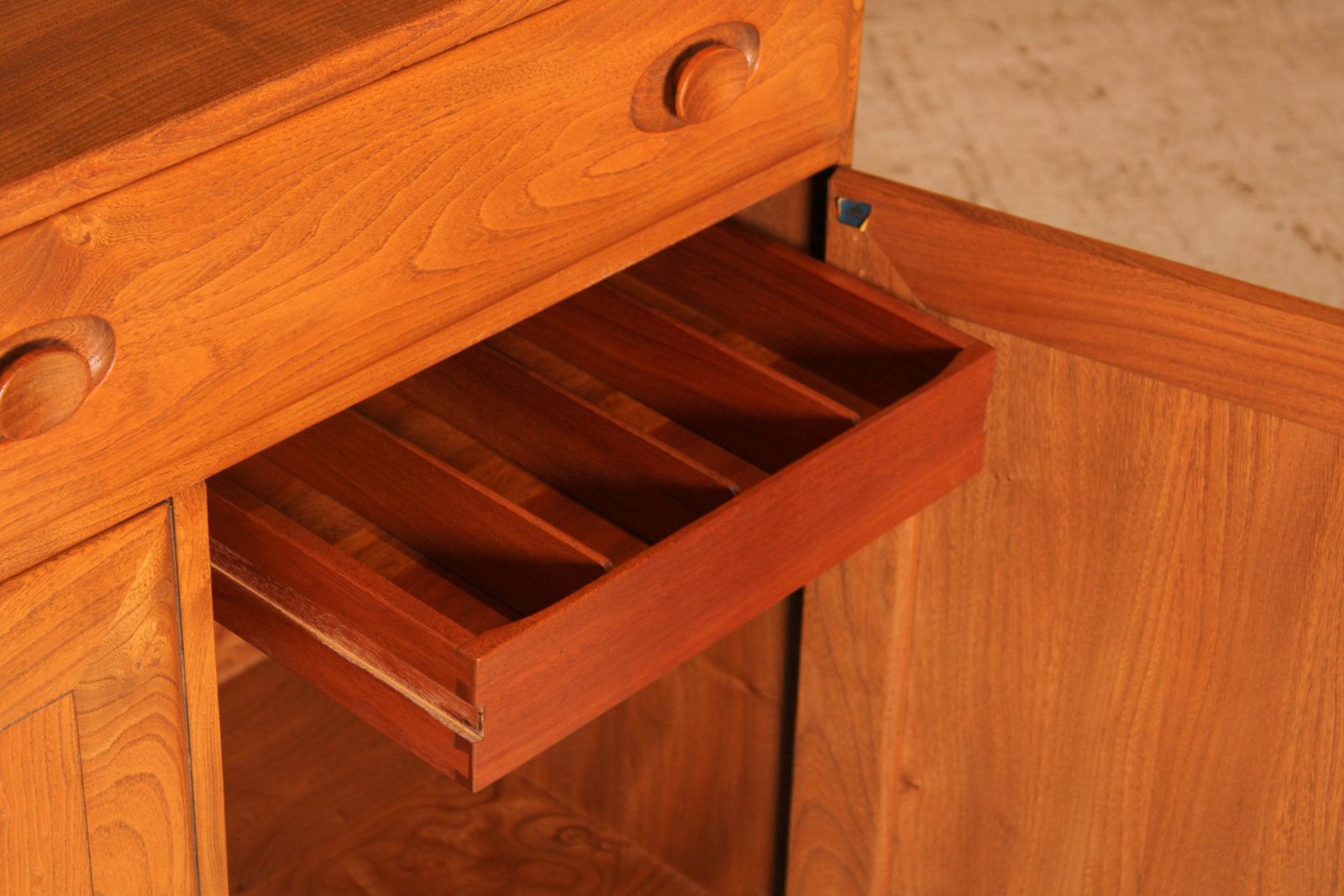 Furniture Mid Century Ercol Windsor Solid Elm Sideboard On Casters, Circa 1960s photo