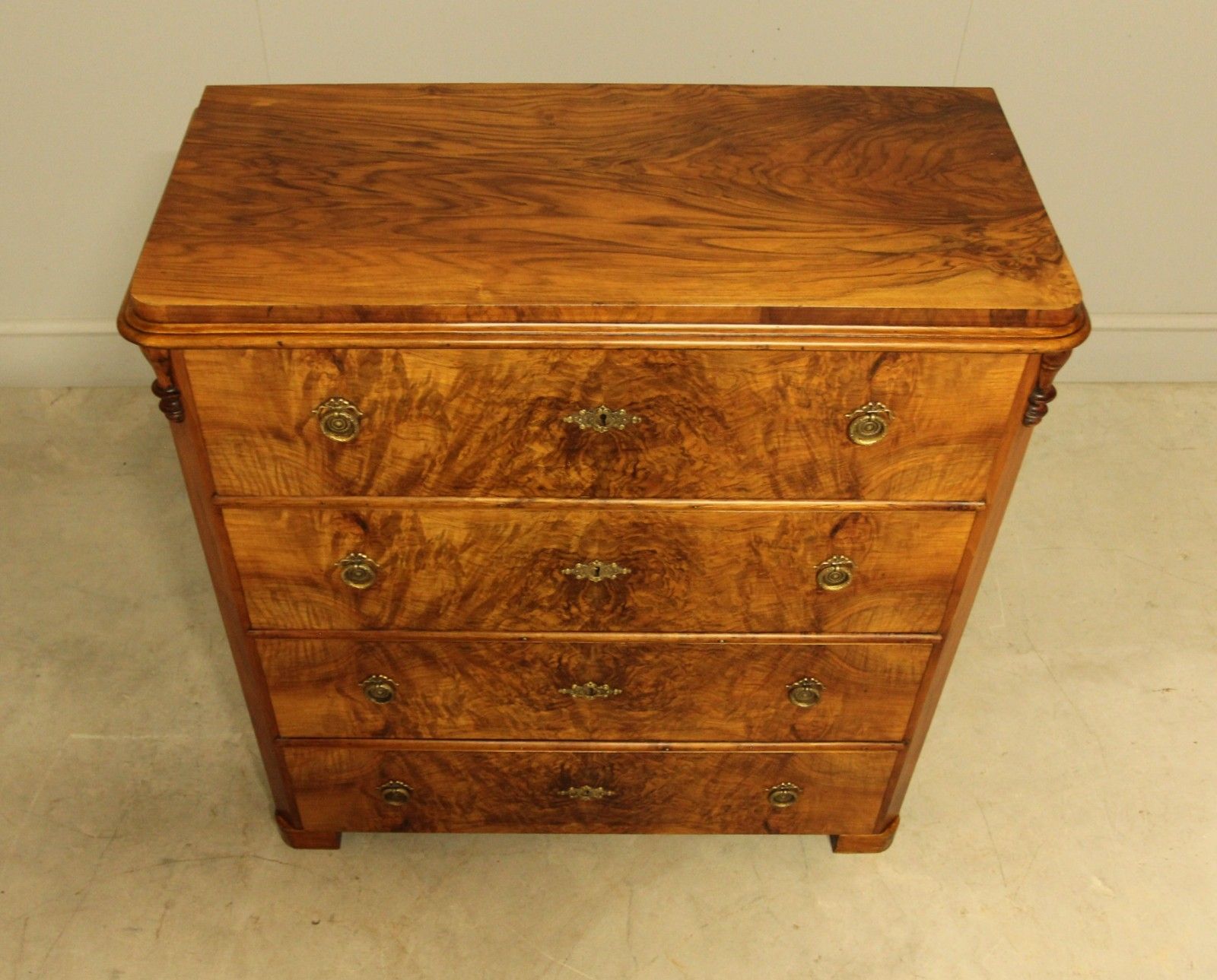 A Late 19th‑Century Swedish Burr Walnut Chest Of Drawers photo for sale