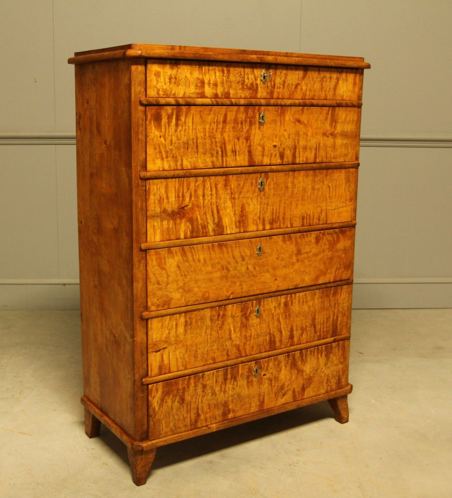 An Early 20th‑Century Swedish Birch Tall Chest Of Drawers photo furniture