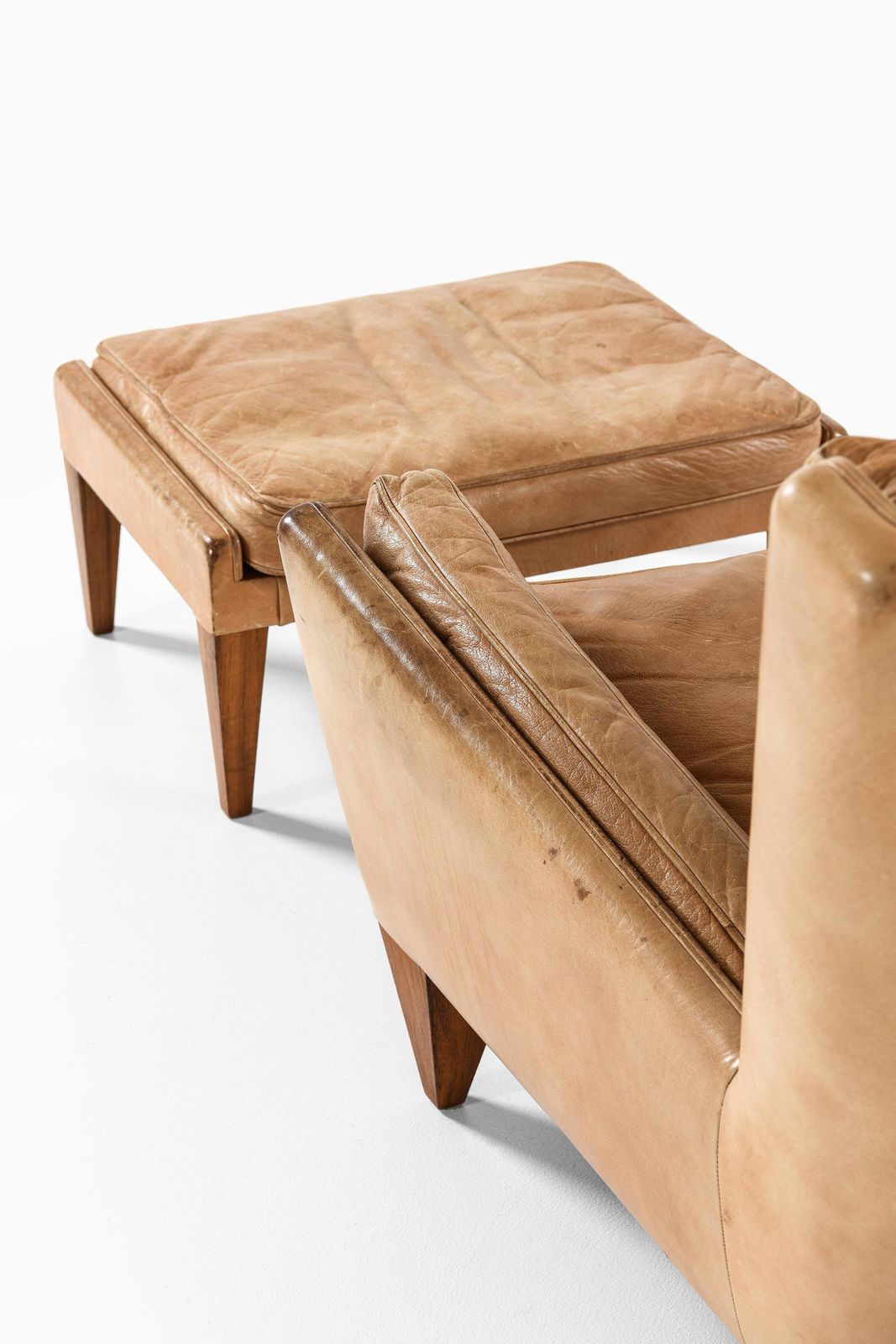 photo furniture Easy Chair In Leather And Rosewood With Stool By Illum Wikkelsø, 1960s