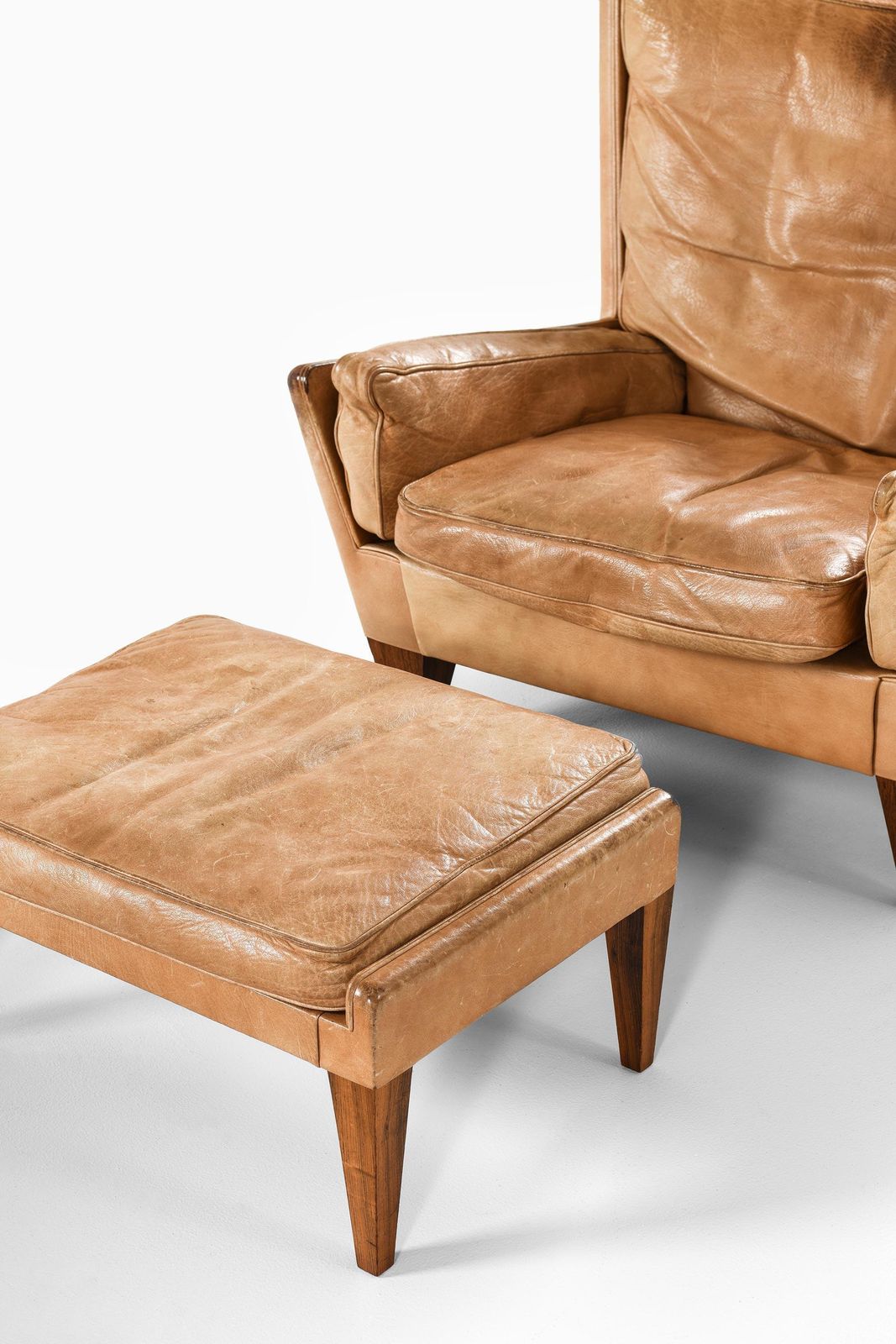 Furniture Easy Chair In Leather And Rosewood With Stool By Illum Wikkelsø, 1960s photo