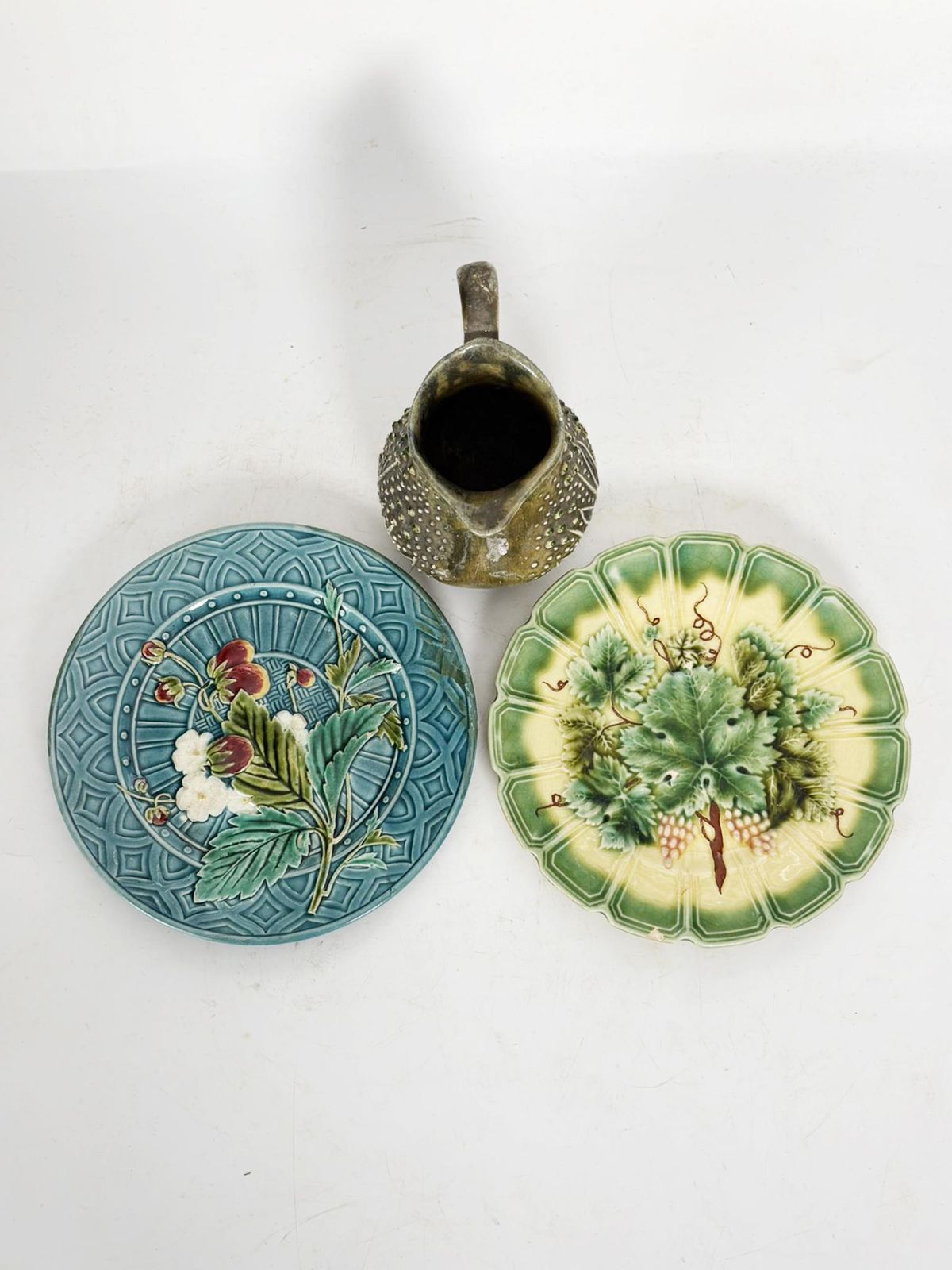 Set Of Majolica Plates Signed With Floral Motifs And A Pitcher photo for sale