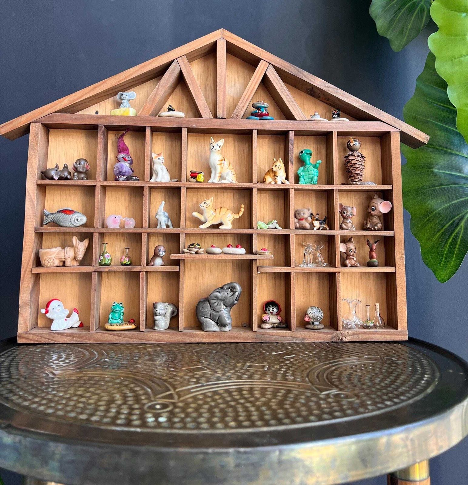 Vintage Curios Cabinet Filled With Miniature Figurines photo furniture