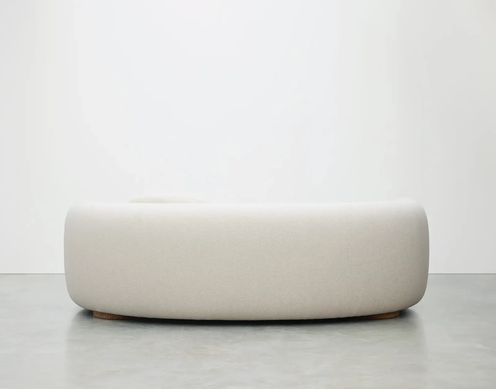 Handmade Sedilia Sennen Curved Sofa, Ismay Bouclé Parchment, Black Walnut Natural Oil Base photo for sale