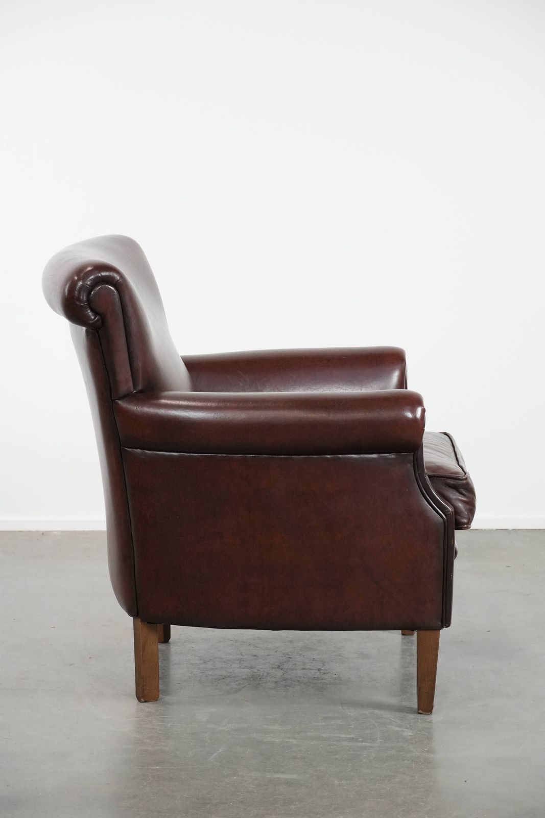 Dark Luxurious Sheepskin Armchair With A Timeless Look photo for sale