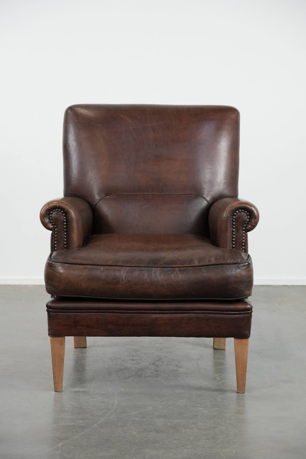 Beautiful Characterful Sheepskin Armchair With A Deep Color photo furniture