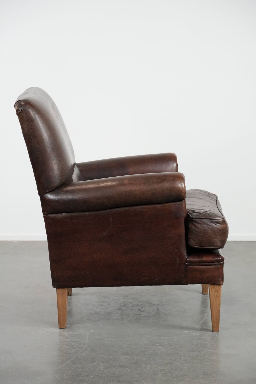 Characterful Sheepskin Armchair With A Beautiful Deep Color photo for sale