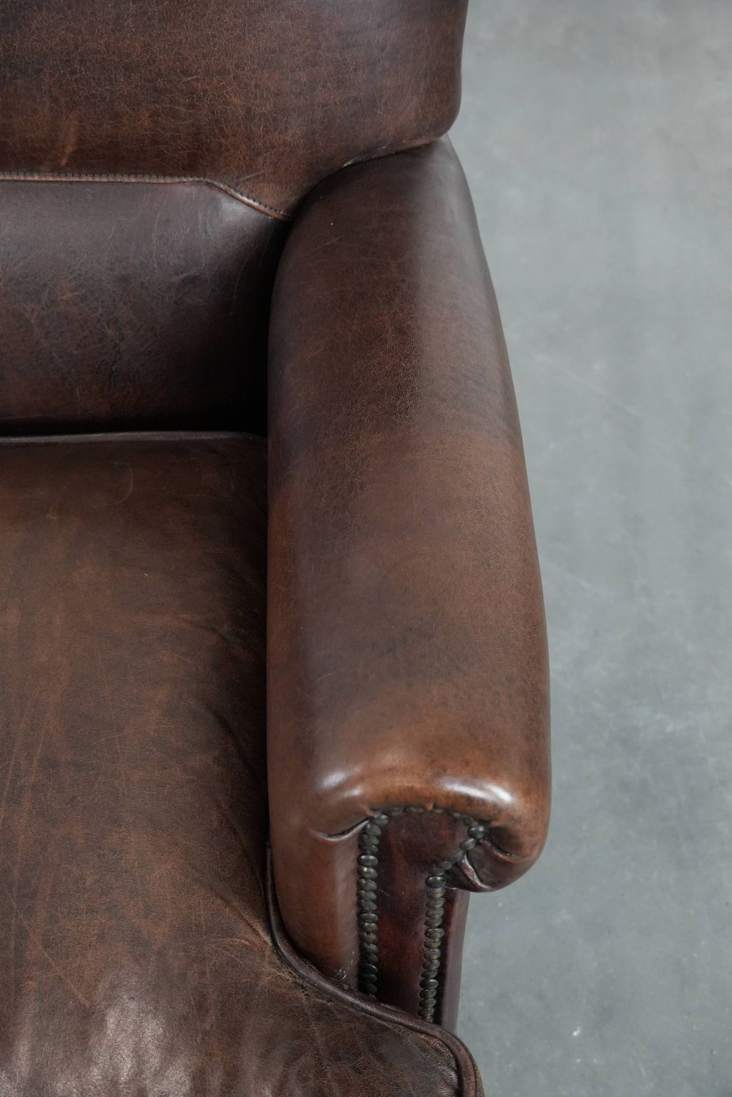 Characterful Sheepskin Armchair With A Beautiful Deep Color photo vintage